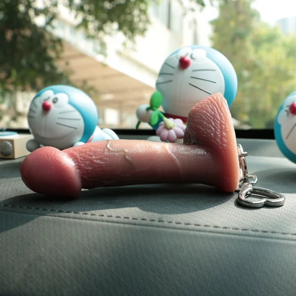 Rounded Coronal Dildo Pendant – Flesh-Toned Silicone Adornment